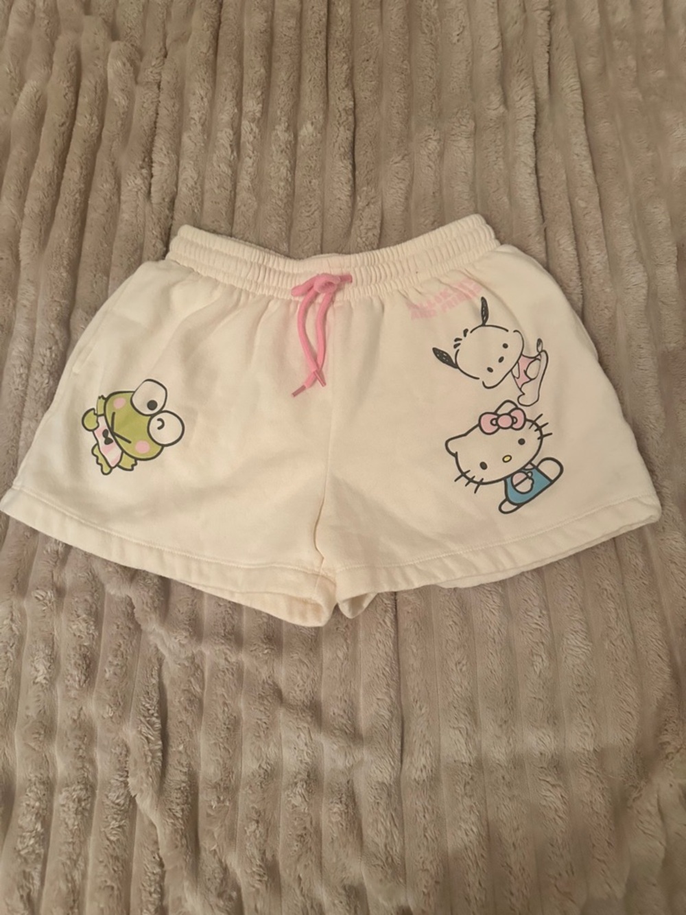 Hello Kitty Cream Athletic Shorts with Pink Drawstring and Character Prints
